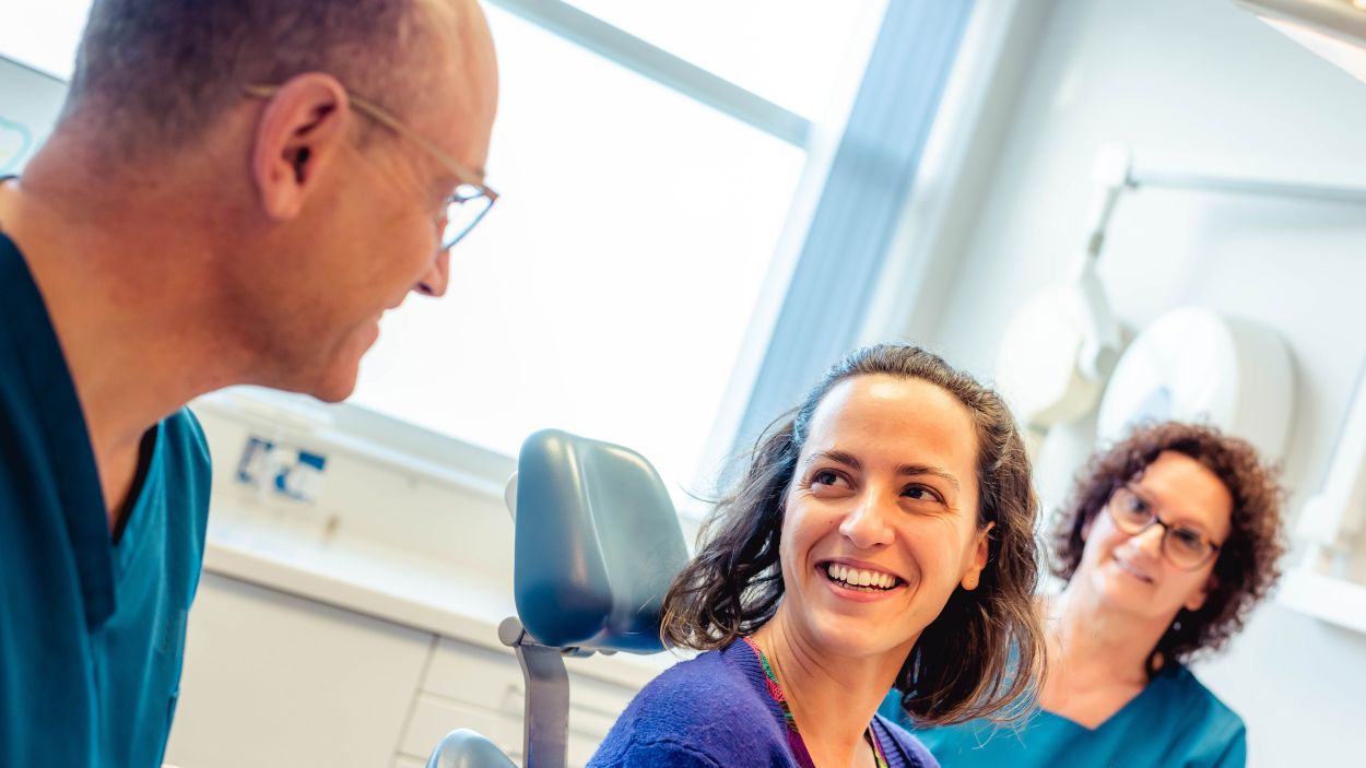 Dentist consulting with a patient at Castelnau Dentists in Barnes